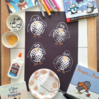 Potato Masher Stamped Penguins On Black Paper