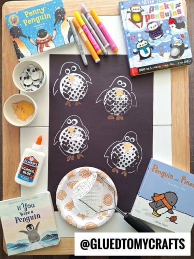 Potato Masher Stamped Penguins On Black Paper