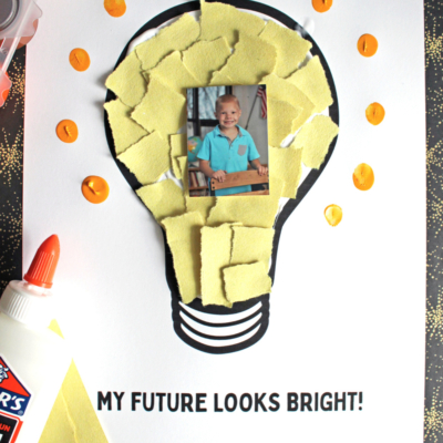 A children’s craft features a photo of a child in the center of a lightbulb outline, filled with torn yellow paper and orange dots. Text reads “MY FUTURE LOOKS BRIGHT!” and a “FREE PRINTABLE!!!” banner is at the bottom.