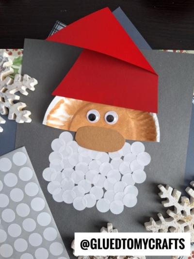 Use WHITE dot stickers to make a Santa beard