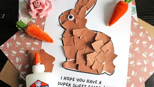 A paper craft of a bunny made from torn brown paper on white paper, with the message I hope you have a super sweet Easter! Nearby are fake flowers, carrots, a bottle of glue, and patterned paper.