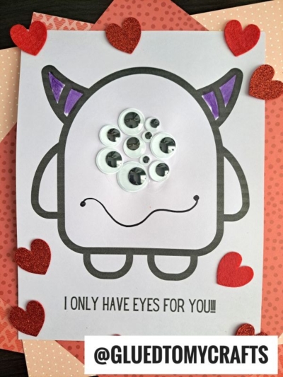 A cute monster drawing with purple horns and multiple googly eyes, surrounded by red and glitter heart shapes. The text below reads ONLY HAVE EYES FOR YOU!!! and @GLUEDTOMYCRAFTS.