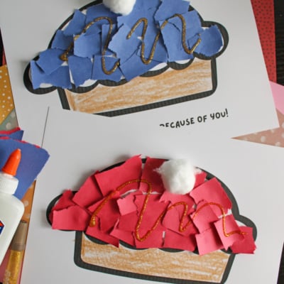 Two paper cupcake crafts with torn blue and red paper, gold glitter, and cotton ball toppings are displayed on printed cupcake outlines. The text says “Life is as sweet as pie because of you!” and “FREE PRINTABLE!!!”.