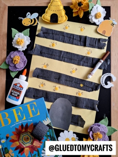 A bee-themed crepe paper craft idea features yellow paper with black crepe paper stripes, small bee drawings, felt flowers, glue, a marker, a “BEE” book, and honeycomb decorations. @GLUEDTOMYCRAFTS is written at the bottom.