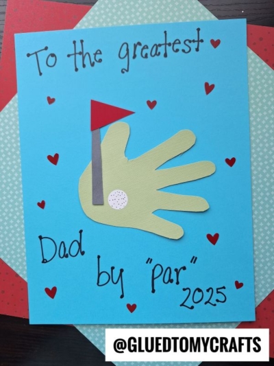 A HANDPRINT FATHER'S DAY card features a cutout hand as a golf green with a red flag, golf ball, and red hearts. The card reads, "To the greatest Dad by par 2025." @GLUEDTOMYCRAFTS is at the bottom.