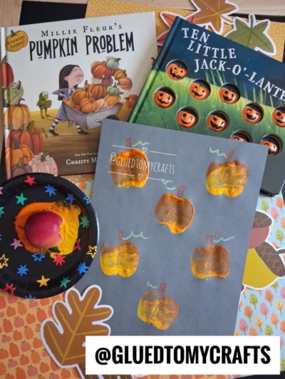 Children’s pumpkin books, a paper pumpkin craft, and vibrant yellow apple print art—including an adorable apple stamped craft—are displayed on a fall-themed background with an @GLUEDTOMYCRAFTS label at the bottom.