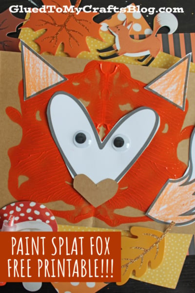 A handmade fox craft with a paint splat body, googly eyes, and paper ears, nose, and tail. Surrounded by autumn-themed paper cutouts. Text: PAINT SPLAT FOX FREE PRINTABLE!!!.