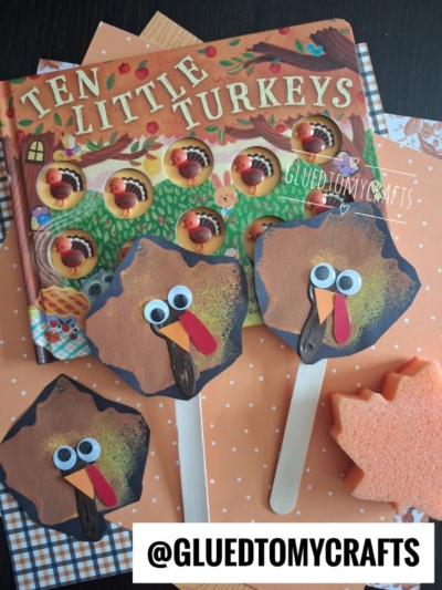 A children’s turkey craft with googly eyes and craft sticks, a Ten Little Turkeys book, orange polka dot paper, and a leaf-shaped sponge makes for the perfect addition to your collection of FALL CRAFTS FOR KIDS. Text reads @GLUEDTOMYCRAFTS.