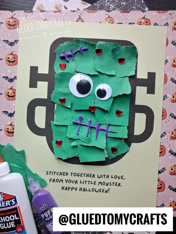 A handmade Halloween card featuring a Frankenstein monster made from torn green paper, googly eyes, and purple puff paint stitches, with the text Stitched together with love, from your little monster. Happy Halloween!.